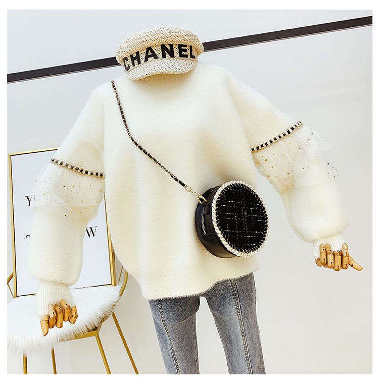 Női pehely pulóver tüll elemmel fehér és fekete színben - széles modell