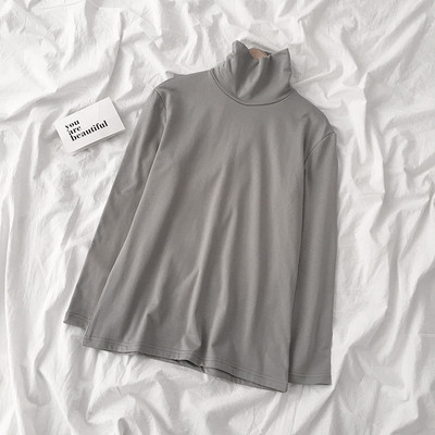 Καθημερινή γυναικεία μπλούζα σε διάφορα χρώματα με υψηλό γιακά και μακρύ μανίκι