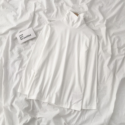 Καθημερινή γυναικεία μπλούζα σε διάφορα χρώματα με υψηλό γιακά και μακρύ μανίκι