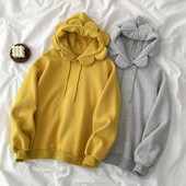 Szürke és sárga színű női pulóver kapucnival és nyakkendővel