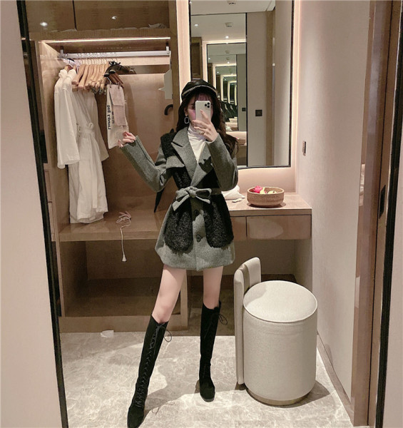 Női őszi-téli kabát övvel és pehelyzsebekkel