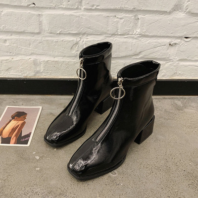 Κομψές γυναικείες μπότες από έκο δερμα και έκο σουετ με φερμουάρ και χοντρό τακούνι  σε μαυρό χρώμα