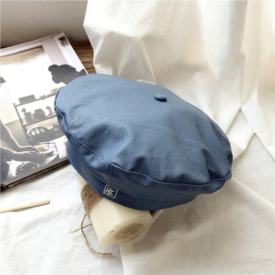 Modern női barett ökobőrből, barna, kék és fekete színben