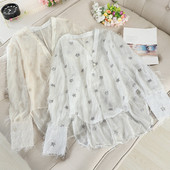 Aszimmetrikus női ing modell, rojtokkal és V-nyakkal