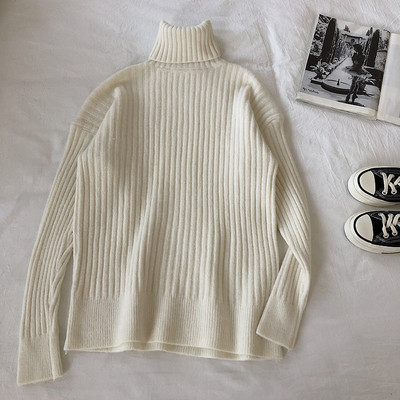 Alkalmi női pulóver hosszú ujjal és magas gallérral