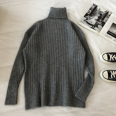 Alkalmi női pulóver hosszú ujjal és magas gallérral