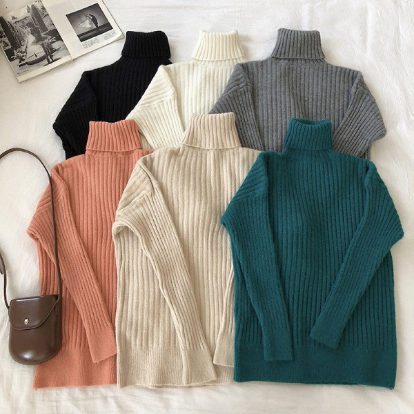 Alkalmi női pulóver hosszú ujjal és magas gallérral