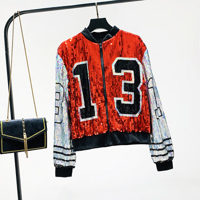 Női pulóver flitterekkel és cipzárral piros és fekete színben