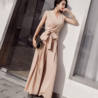 Μοντέρνα γυναικεία ολοσωμη φόρμα ε φαρδιές λωρίδες και ζώνη