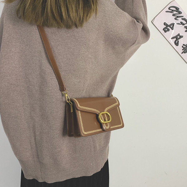 Öko bőrből készült női táska fém rögzítéssel, négy színben