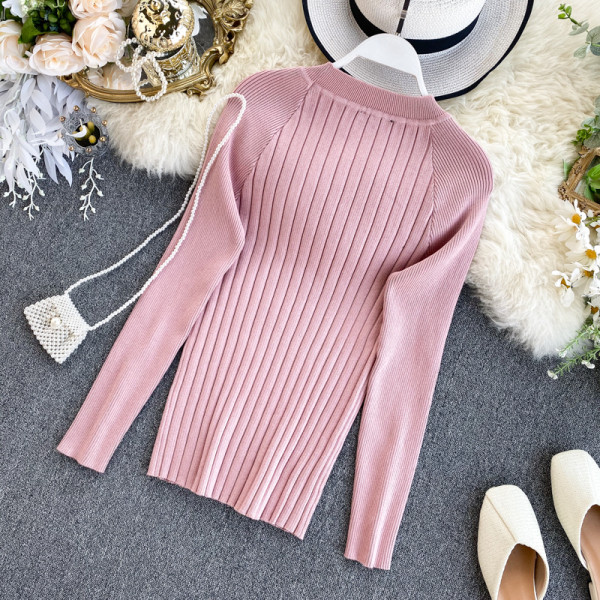 Μοντέρνο γυναικείο πουλόβερ Slim με κουμπιά σε ροζ και μαύρο χρώμα