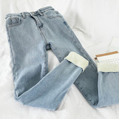 Alkalmi női farmer kék színben, magas derékkal és zsebekkel