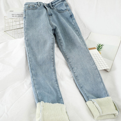 Alkalmi női farmer kék színben, magas derékkal és zsebekkel