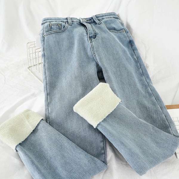 Alkalmi női farmer kék színben, magas derékkal és zsebekkel