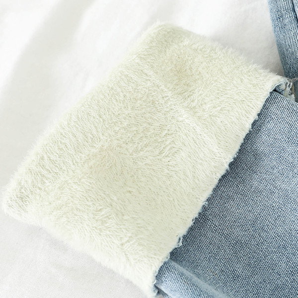 Alkalmi női farmer kék színben, magas derékkal és zsebekkel