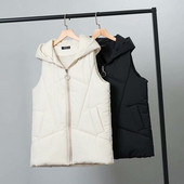 Alkalmi női mellény zsebekkel és cipzárral fehér és fekete színben