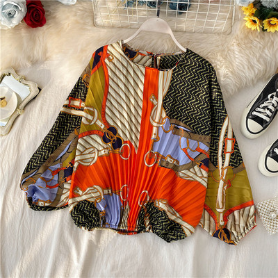 Modern rakott női blúz ovális nyakkivágással, színes mintával több színben