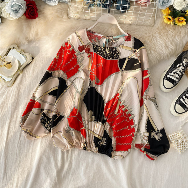 Modern rakott női blúz ovális nyakkivágással, színes mintával több színben