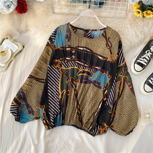 Modern rakott női blúz ovális nyakkivágással, színes mintával több színben