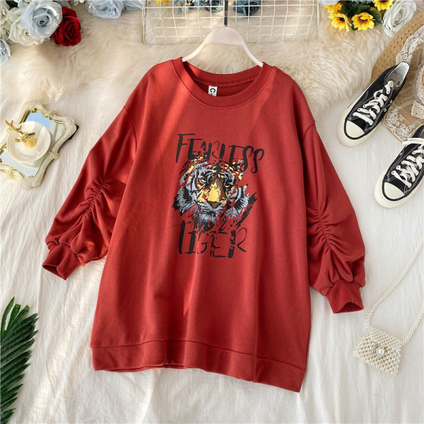 Modern női blúz ovális nyakkivágással és rátéttel több színben