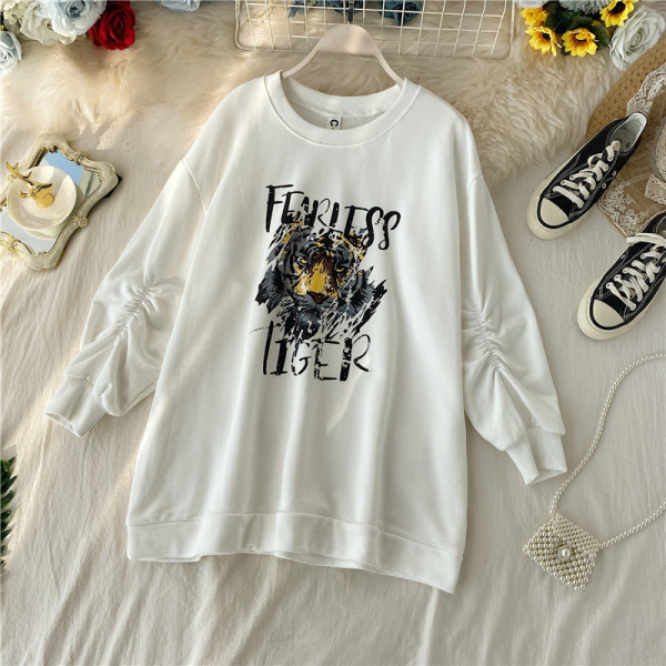 Modern női blúz ovális nyakkivágással és rátéttel több színben