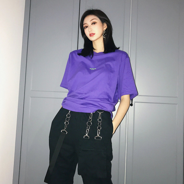 Fém elemes, fekete zsebes női sportnadrág