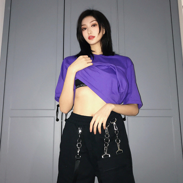 Fém elemes, fekete zsebes női sportnadrág