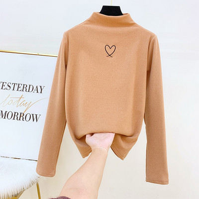 Modern női pulóver pólógallérral és hímzéssel