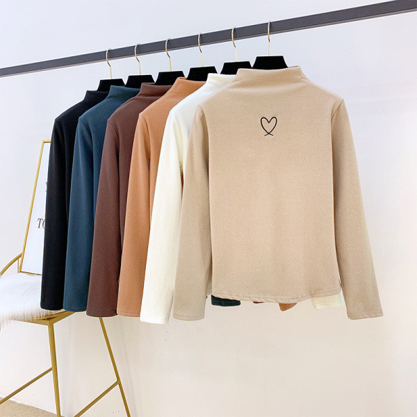 Modern női pulóver pólógallérral és hímzéssel