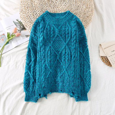 Új modell női pulóver szakadt motívummal, ovális nyakkivágással