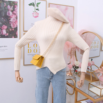 Μοντέρνο γυναικείο πουλόβερ  με στρογγυλη λαιμόκοψη σε λευκό, μαύρο, μπεζ και καφέ χρώμα