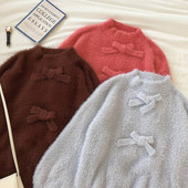 Modern női bolyhos pulóver ovális nyakkivágással és szalaggal