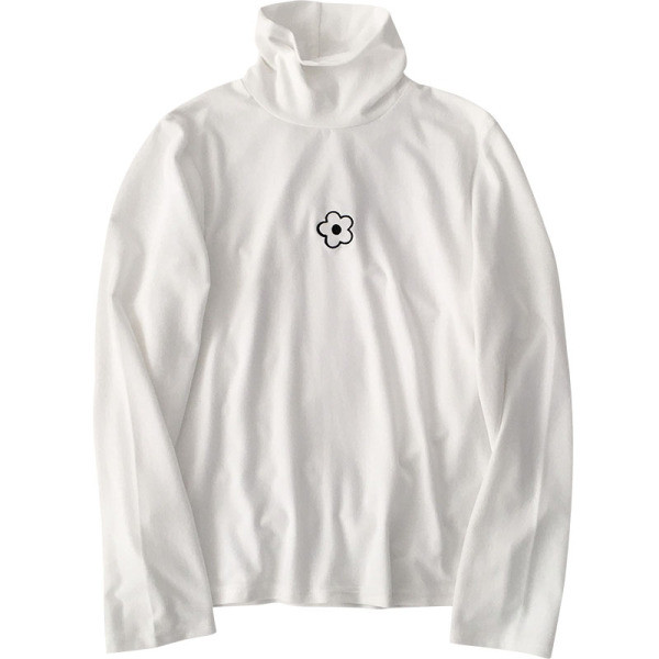 Modern női blúz fekete-fehér színben, magas gallérral és hímzéssel