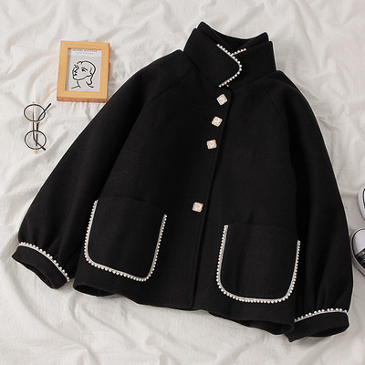 Нов модел дамско палто с копчета и джобове в черен цвят