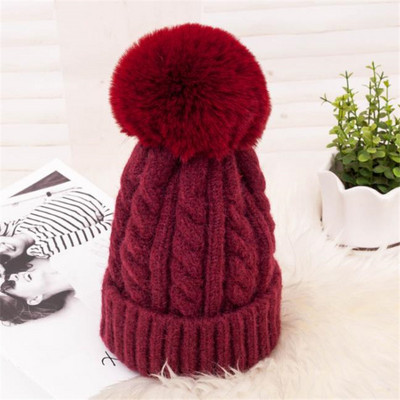 Női téli kötött sapka pehellyel több színben