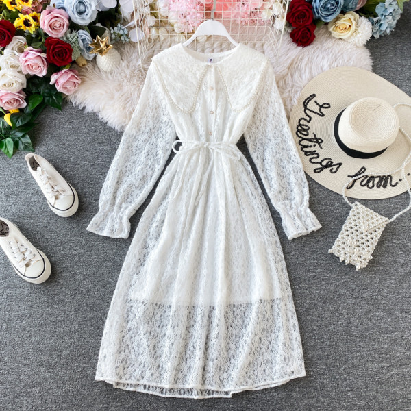 Modern női ruha tüllel és gombokkal több színben