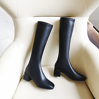 Modern női hosszú csizma vastag sarokkal és cipzárral fekete színben