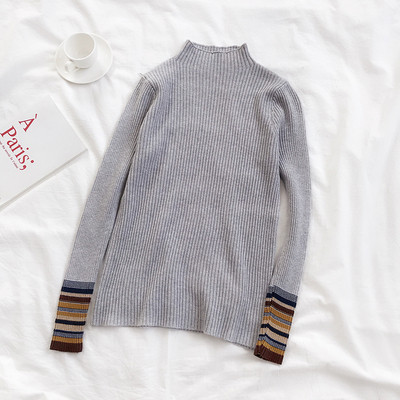 Μοντέρνο γυναικείο πουλόβερ των γυναικών σε διάφορα χρώματα με υψηλό γιακά