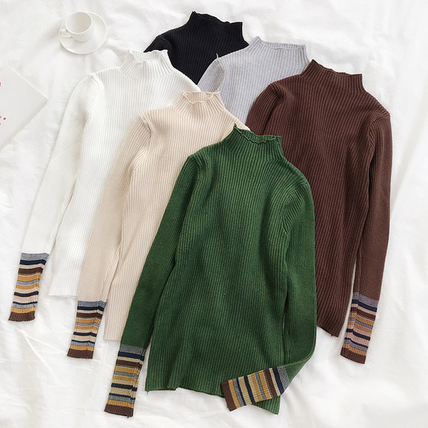 Μοντέρνο γυναικείο πουλόβερ των γυναικών σε διάφορα χρώματα με υψηλό γιακά