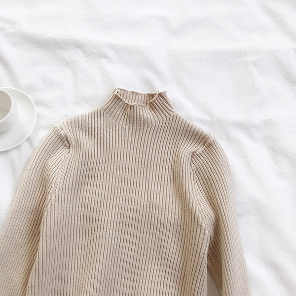 Μοντέρνο γυναικείο πουλόβερ των γυναικών σε διάφορα χρώματα με υψηλό γιακά