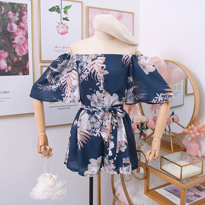 Μοντέρνα γυναικεία ολόσωμη  φόρμες με γυμνούς ώμους και φυτικά μοτίβα