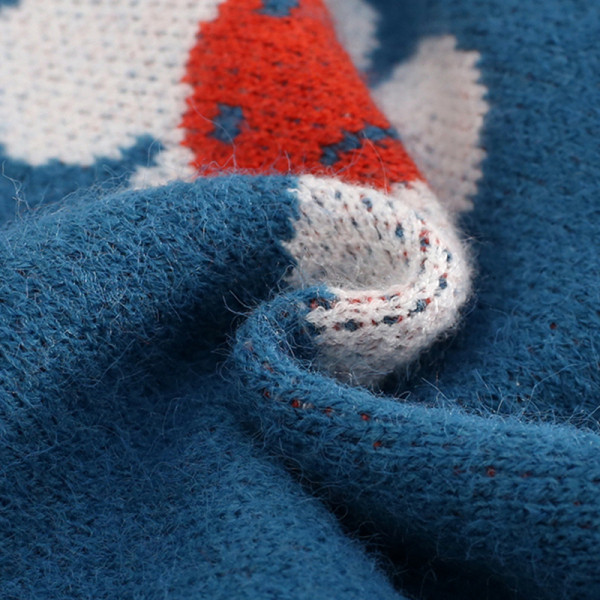 Női kardigán virágmotívumokkal és kék gombokkal