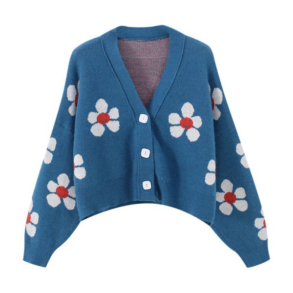 Női kardigán virágmotívumokkal és kék gombokkal