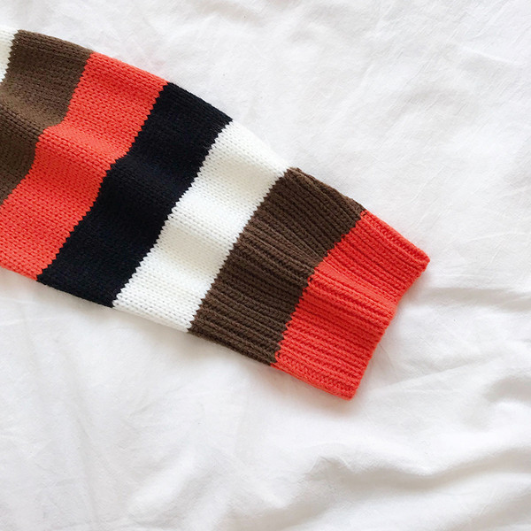 Ριγέ γυναικείο πουλόβερ  με υψηλό κολάρο και μακρύ μανίκι σε τρία χρώματα