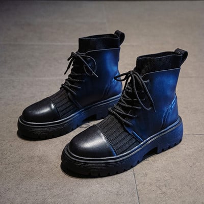 Modern női csizma műbőrből, fűzővel és vastag talppal, fekete színben