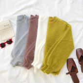 Γυναικείο πουλόβερ  σε τέσσερα χρώματα με οβάλ ντεκολτέ και φαρδιά μανίκια