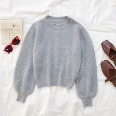 Γυναικείο πουλόβερ  σε τέσσερα χρώματα με οβάλ ντεκολτέ και φαρδιά μανίκια