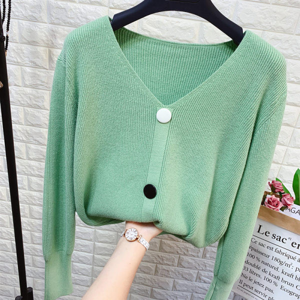 Női kötött pulóver spitz nyakkivágással és gombokkal