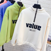 Női blúz pólógallérral, cipzárral és több színben nyomott mintával