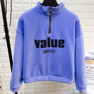 Női blúz pólógallérral, cipzárral és több színben nyomott mintával